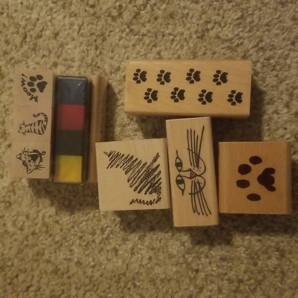 Cat themed wooden stamps.